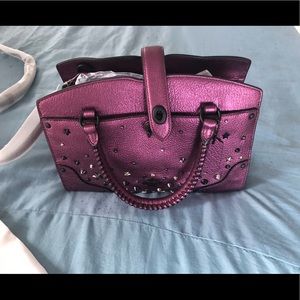 NWT. Genuine Coach clutch - wine / purple